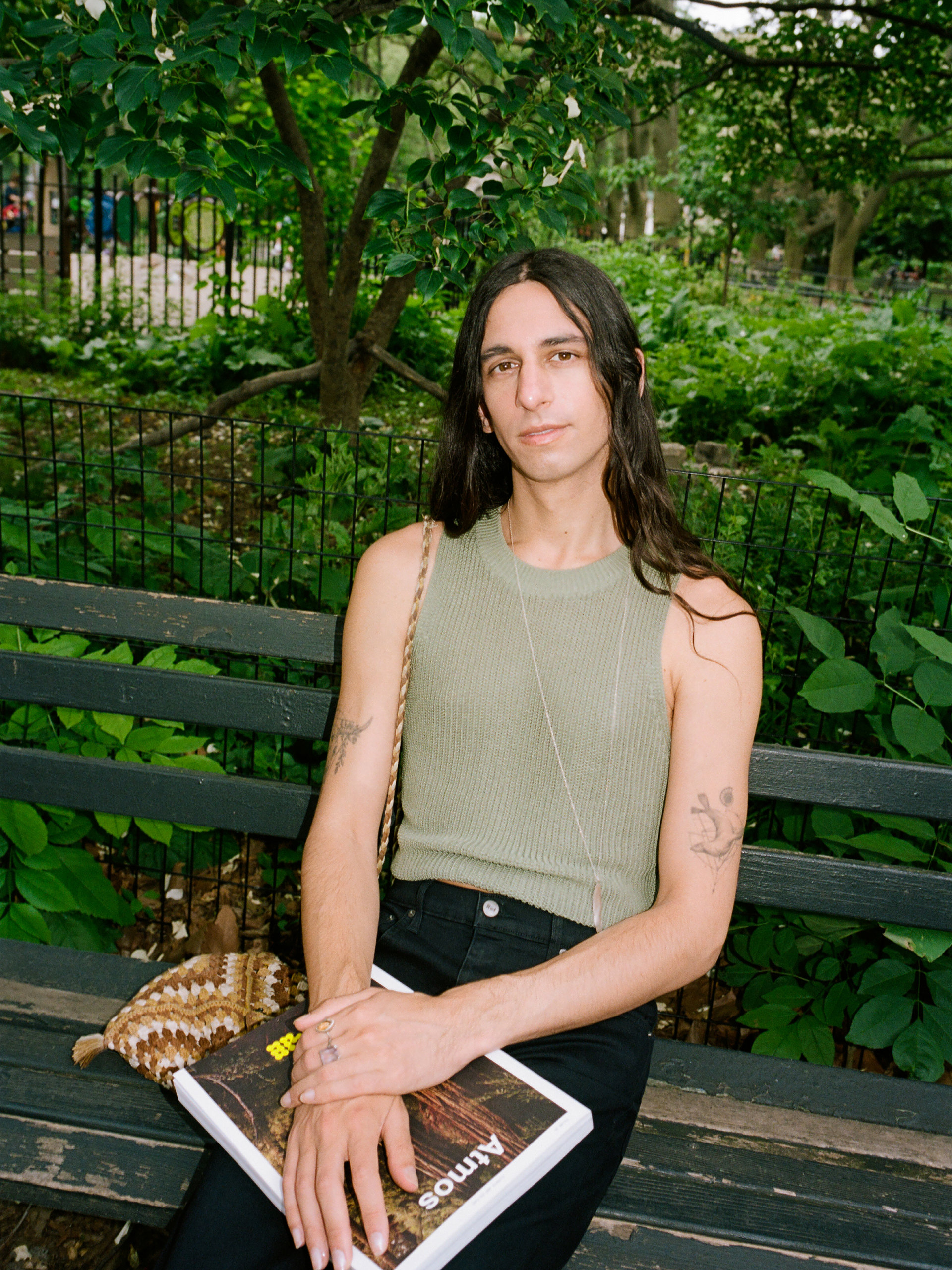 Willow wearing the Lilac Top in ARTICHOKE and the Emma High Rise Jeans in BLACK.